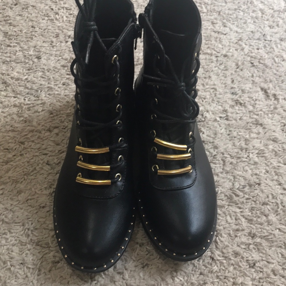 Black and gold boots